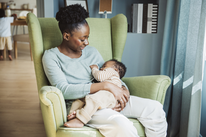 Mother breastfeeding infant